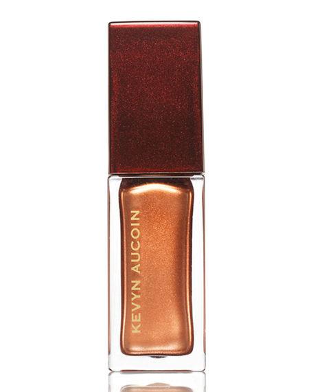 The Lip Gloss Sunlight – Golden Bronze With a Warm Shimmer